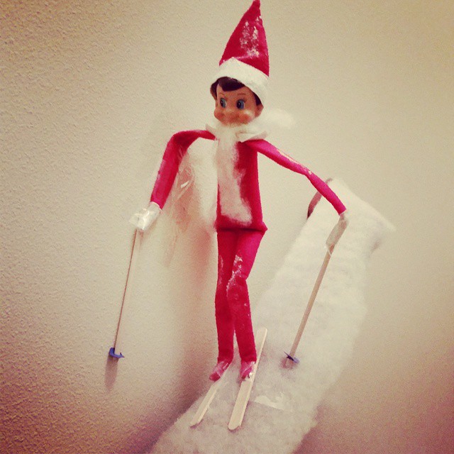 Skiing down the banister. Fake snow, popscicle stick skis, surprisingly easy. Put a little baking soda on his knees and hat.